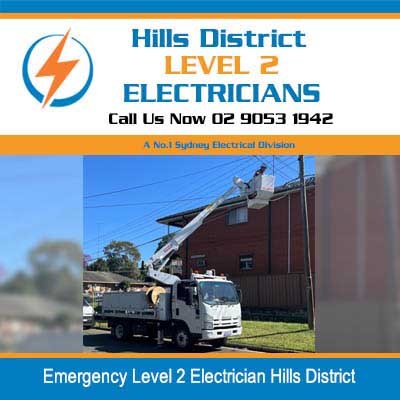 Emergency electrician truck with boom lift positioned for urgent power line work in Hills District