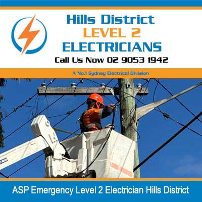 ASP emergency level 2 electrician in cherry picker bucket performing emergency repairs on power pole in Hills District